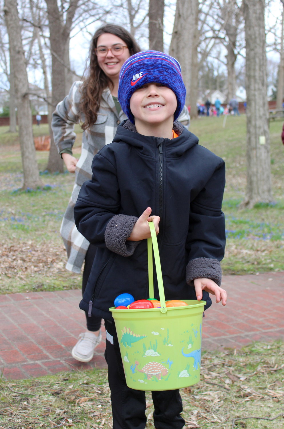 Xander Ruiz, 5, quickly fills his Easter basket with eggs, showing he doesn’t crack under pressure.